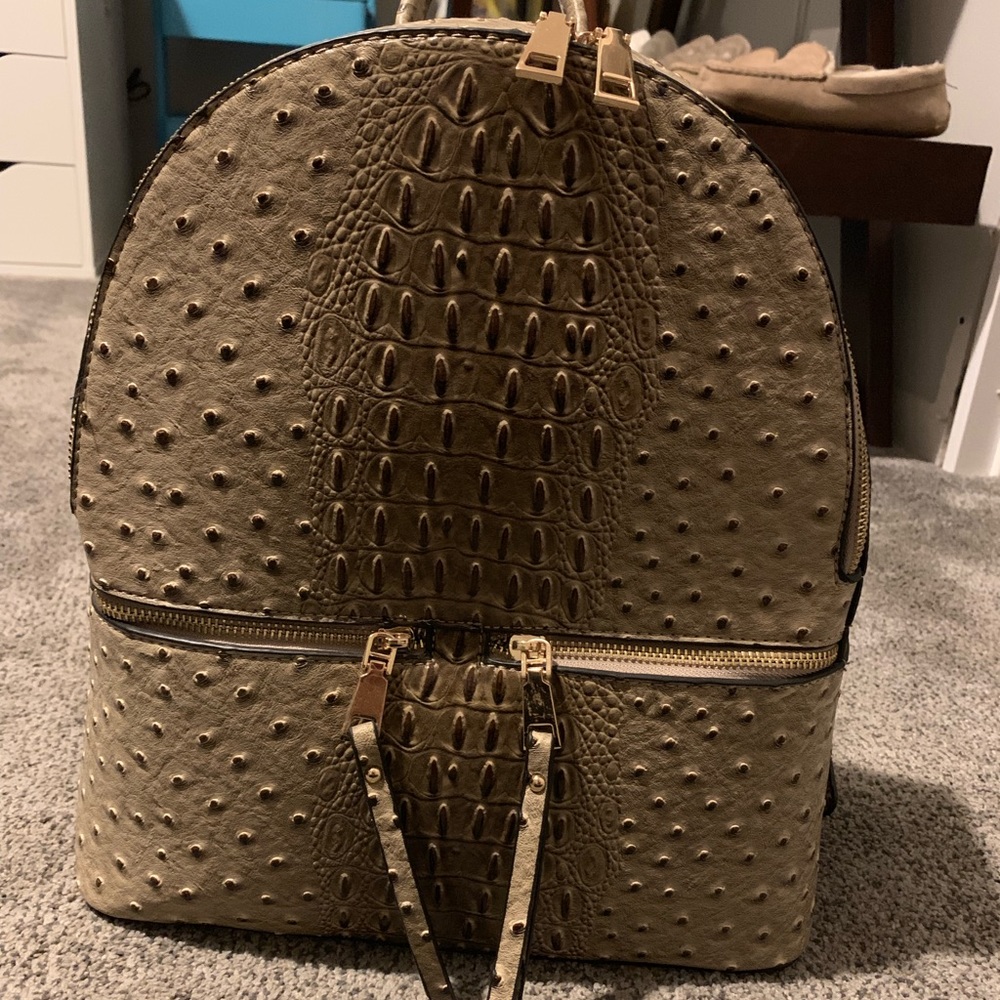 Snake skin back pack purse